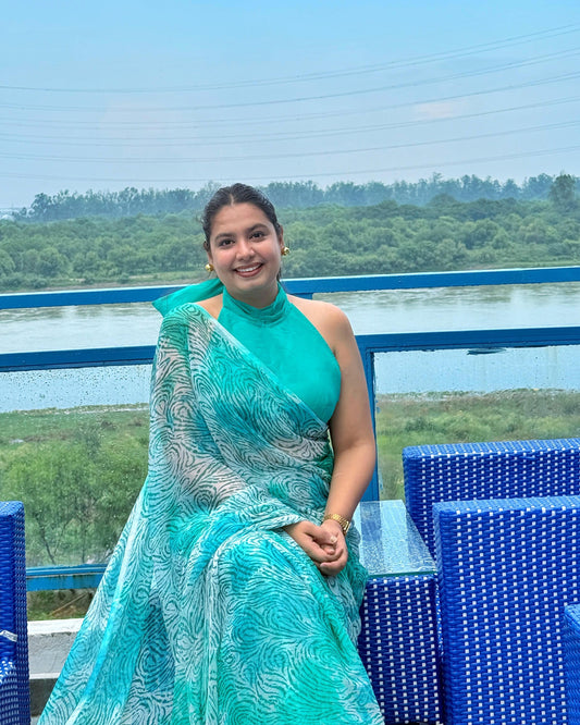 City Chic: Teal Animal Print Pure Chiffon Saree